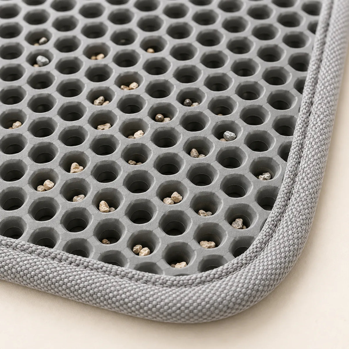 Détail de la texture du tapis de litière Korn