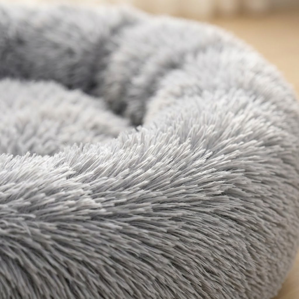 Dun donut cat bed — plush fabric and bolster detail
