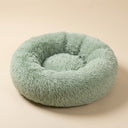 Dun donut cat bed in khaki styled in an interior