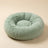 Dun donut cat bed in khaki styled in an interior