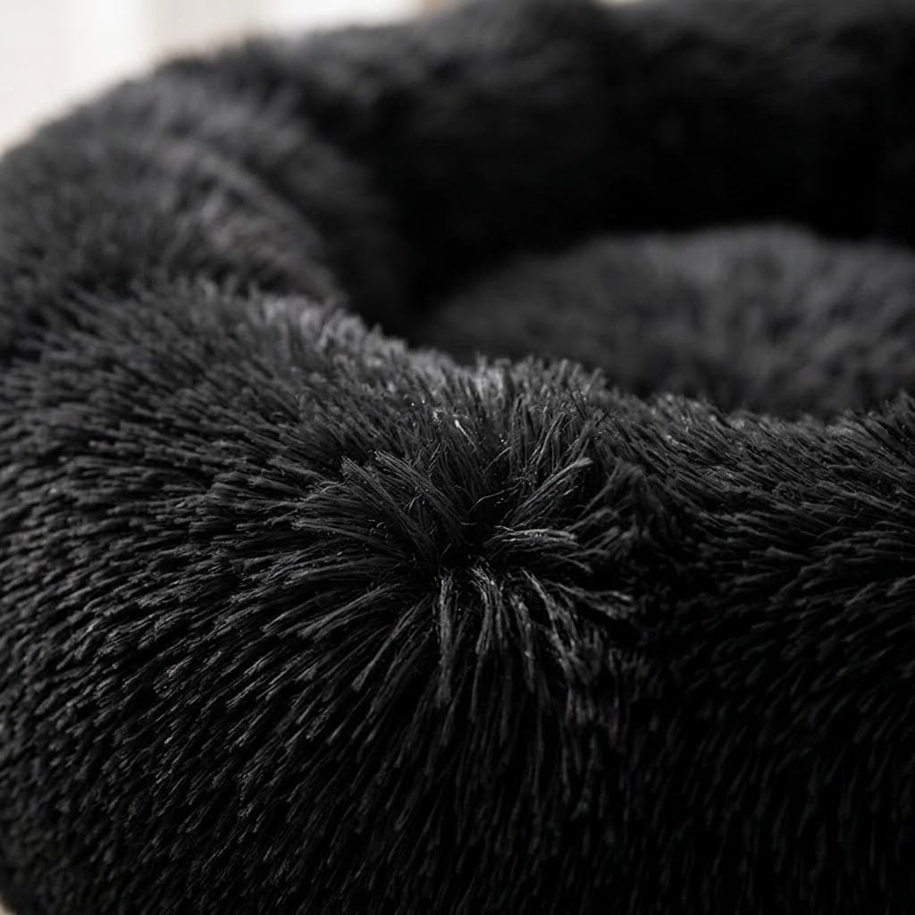 Dvala donut dog bed — plush fabric and padding detail